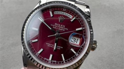 rolex day date cherry red dial|rolex watch with red dial.